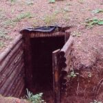 Atstatytas bunkeris ir paminklinis kryžius Obelių šile